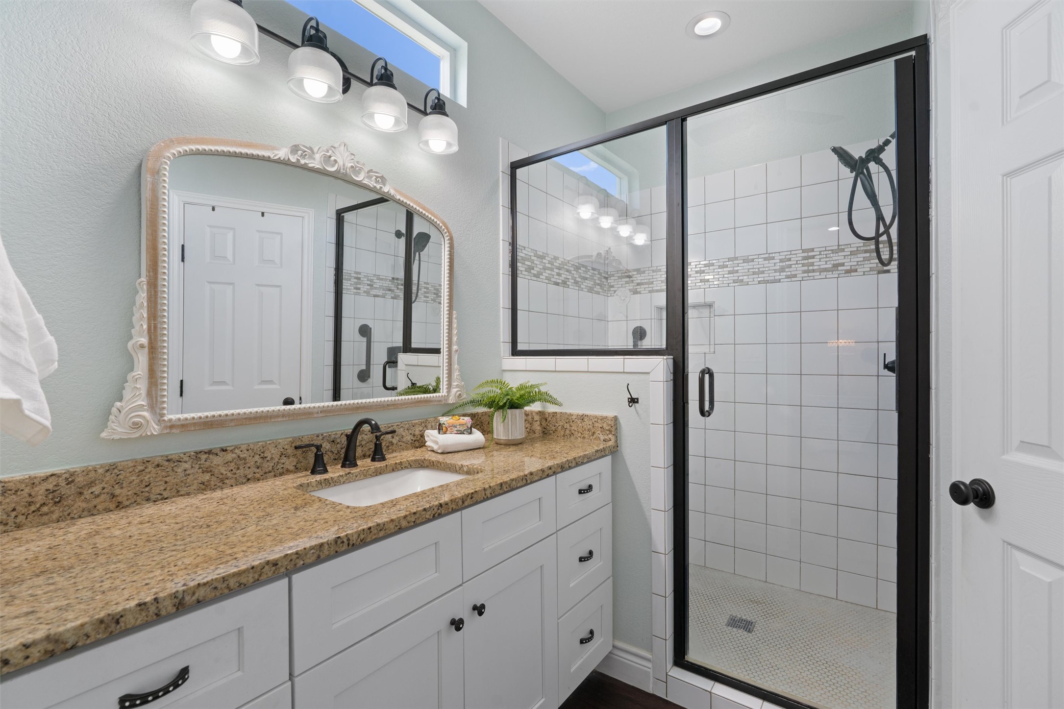 4651 Fm 972 Georgetown, TX 78626 - Photo 31 of 40 a bathroom with a granite countertop sink mirror and double