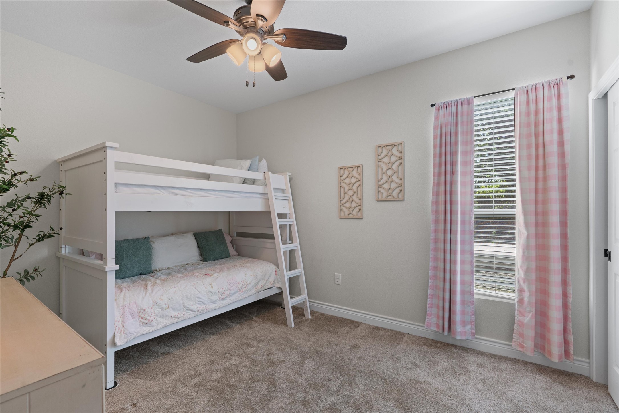4651 Fm 972 Georgetown, TX 78626 - Photo 32 of 40 a bedroom with a bed and a ceiling fan