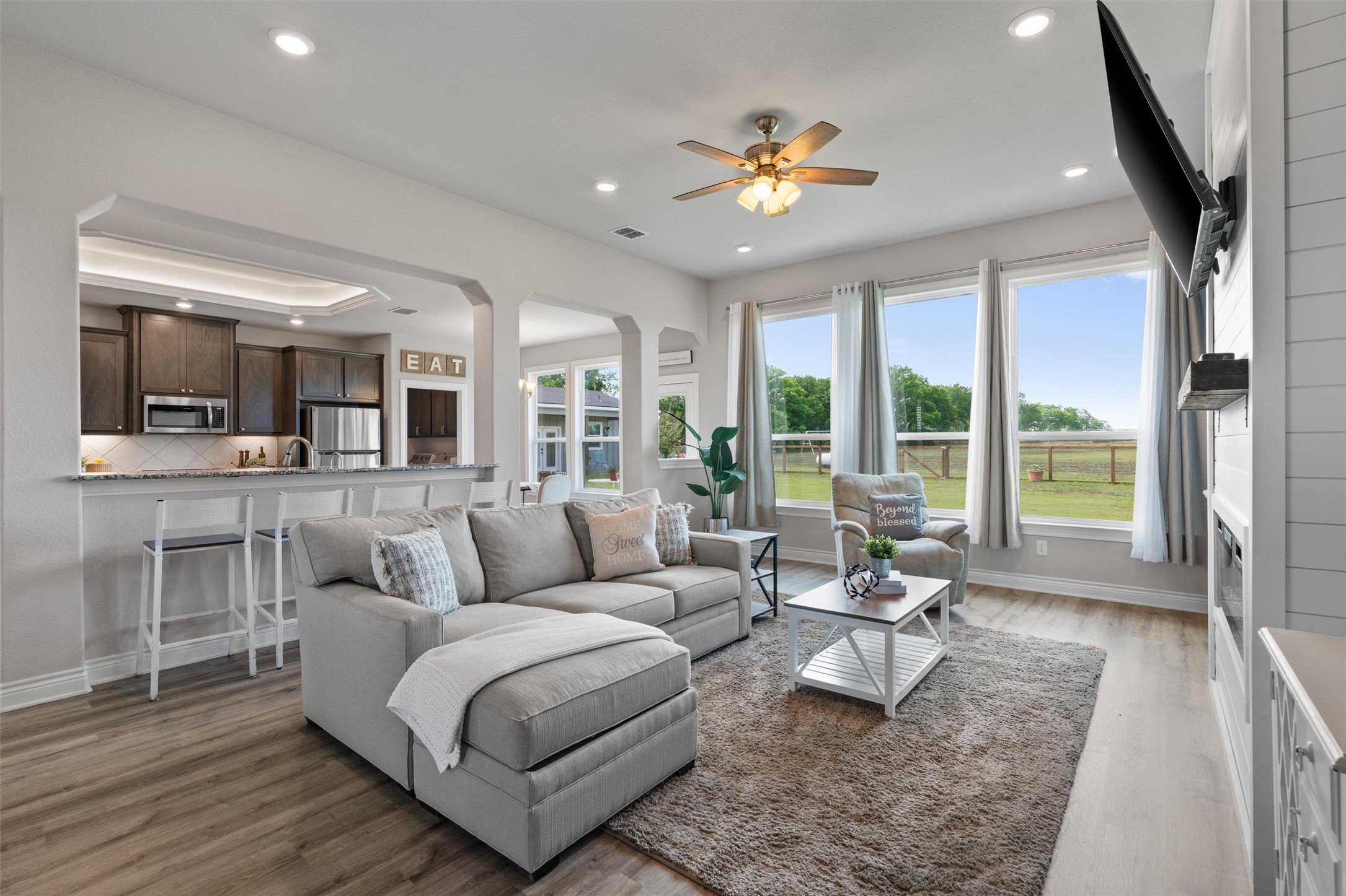 4651 Fm 972 Georgetown, TX 78626 - Photo 7 of 40 a living room with furniture and large windows