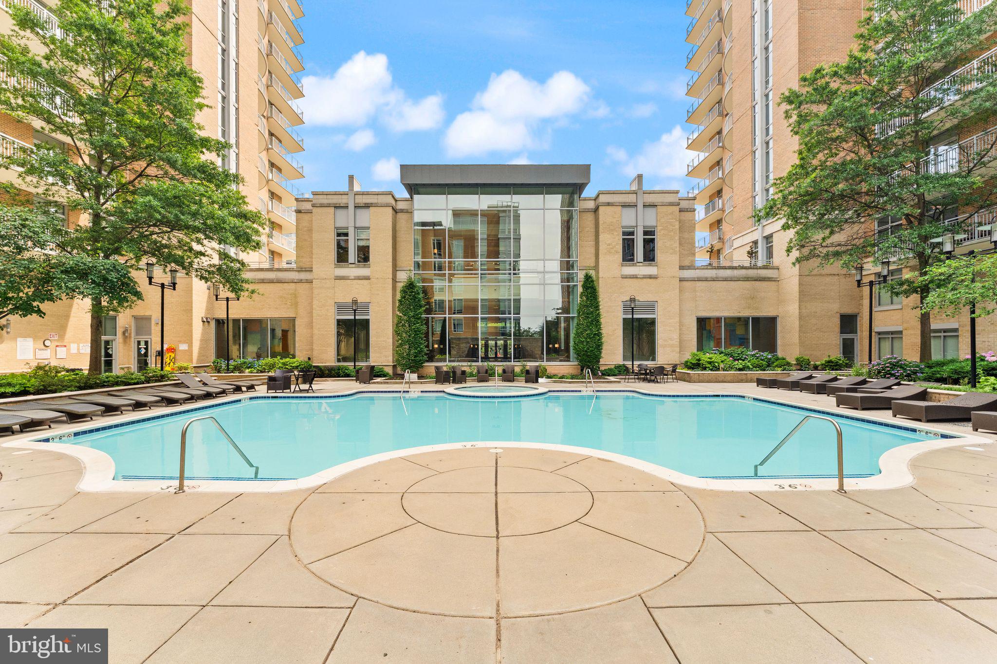 11990 Market Street, Unit 1015 Reston, VA 20190 - Photo 53 of 90 a view of a house with swimming pool and sitting area