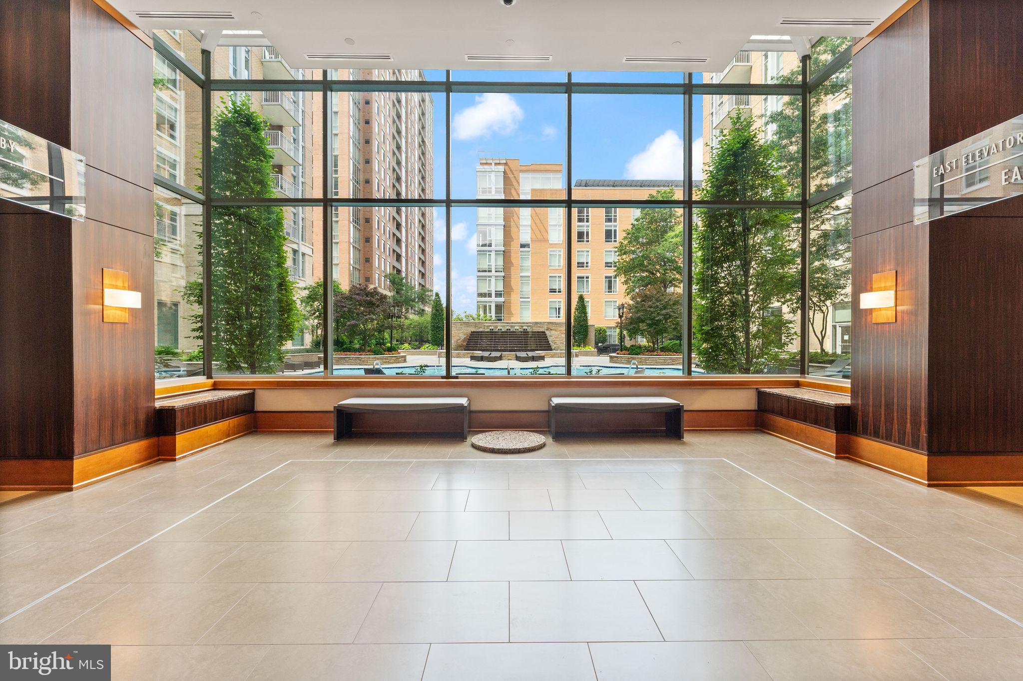 11990 Market Street, Unit 1015 Reston, VA 20190 - Photo 68 of 90 a view of lobby with furniture and large windows