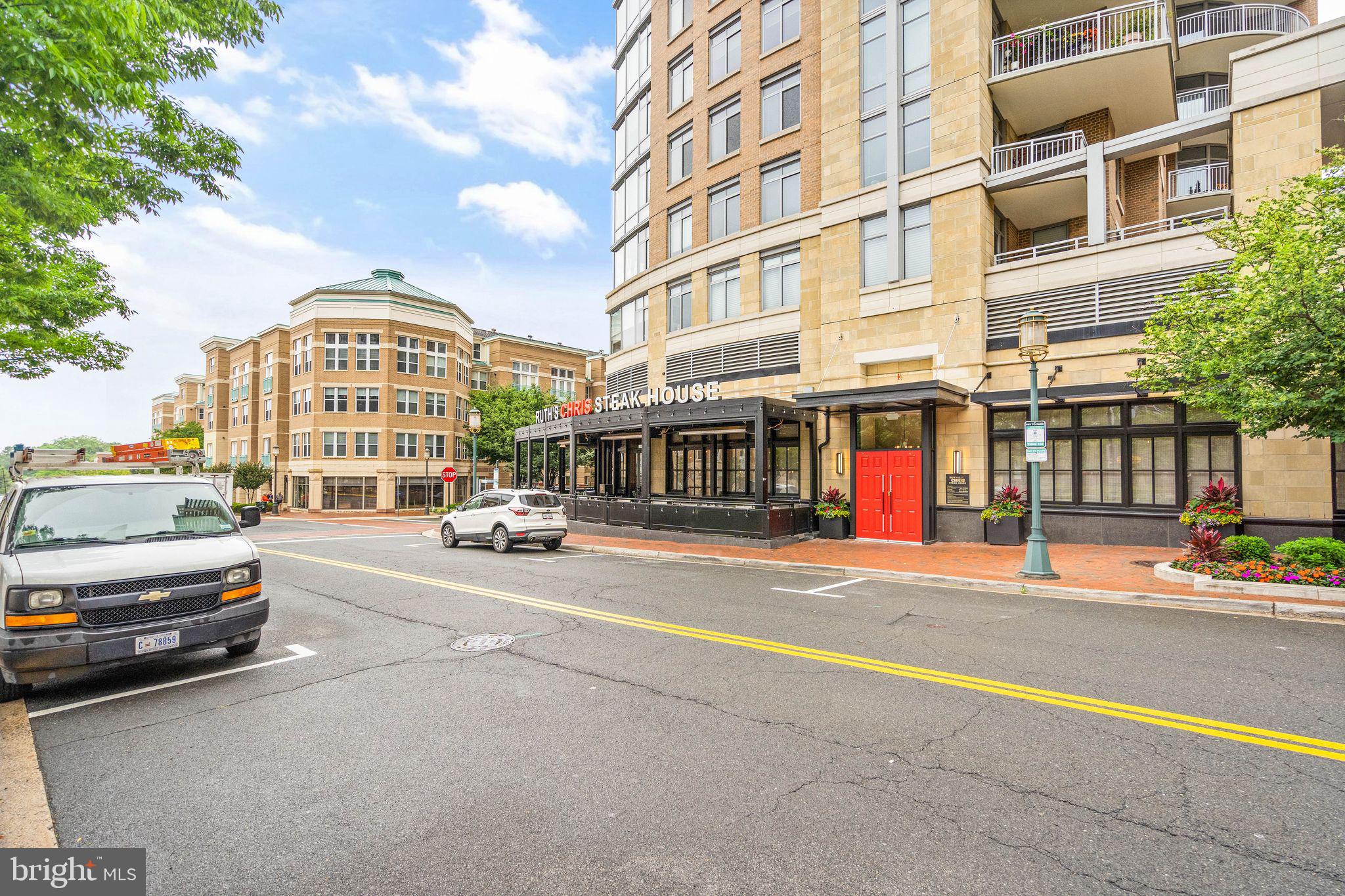 11990 Market Street, Unit 1015 Reston, VA 20190 - Photo 80 of 90 a cars parked on the side of a street