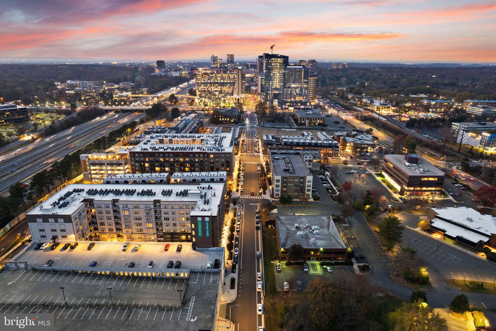 11990 Market Street, Unit 1015 Reston, VA 20190 - Photo 87 of 90 an aerial view of a city with lots of residential buildings