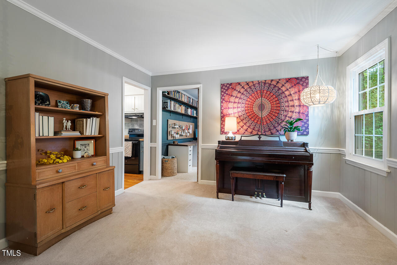 7324 Old Hundred Road Raleigh, NC 27613 - Photo 15 of 92 a living room with furniture a piano and a window