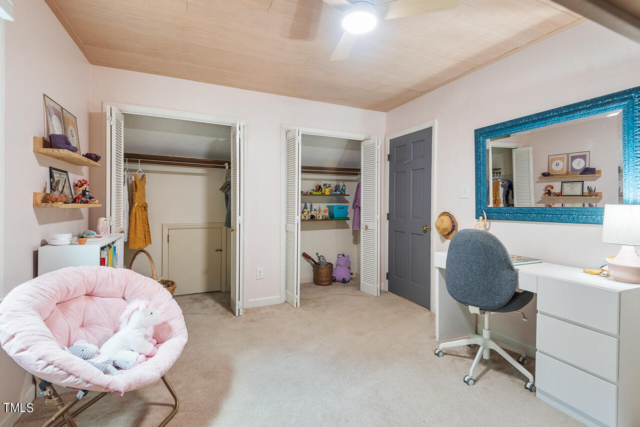 7324 Old Hundred Road Raleigh, NC 27613 - Photo 53 of 92 a view of a workspace with furniture and a window