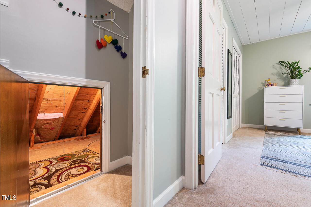 7324 Old Hundred Road Raleigh, NC 27613 - Photo 55 of 92 a view of walk in closet and bedroom view