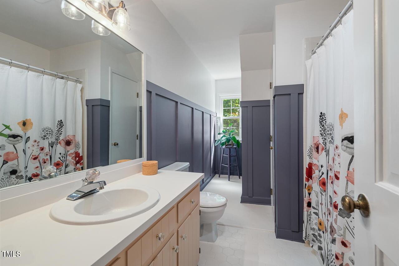 7324 Old Hundred Road Raleigh, NC 27613 - Photo 57 of 92 a bathroom with a sink toilet and shower