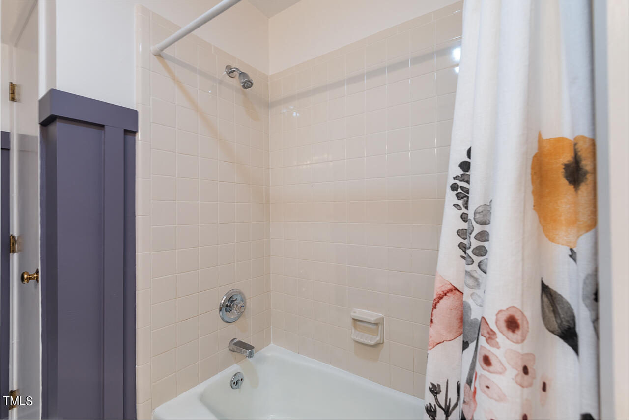 7324 Old Hundred Road Raleigh, NC 27613 - Photo 59 of 92 a bathroom with a bathtub and shower