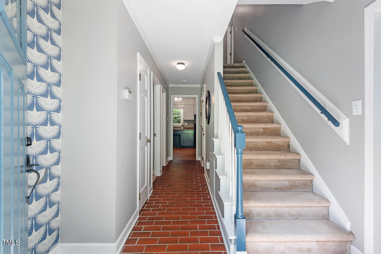 7324 Old Hundred Road Raleigh, NC 27613 - Photo 6 of 92 a view of staircase with white walls