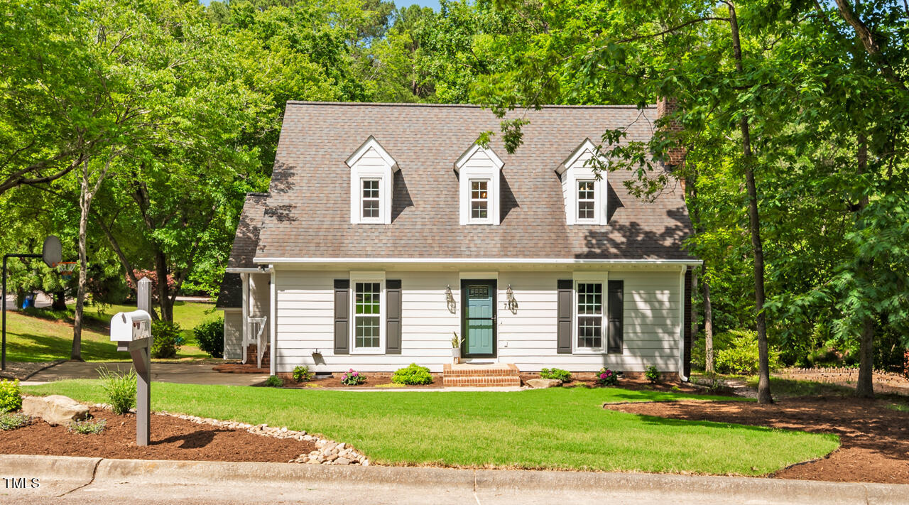7324 Old Hundred Road Raleigh, NC 27613 - Photo 80 of 92 front view of a house with a yard