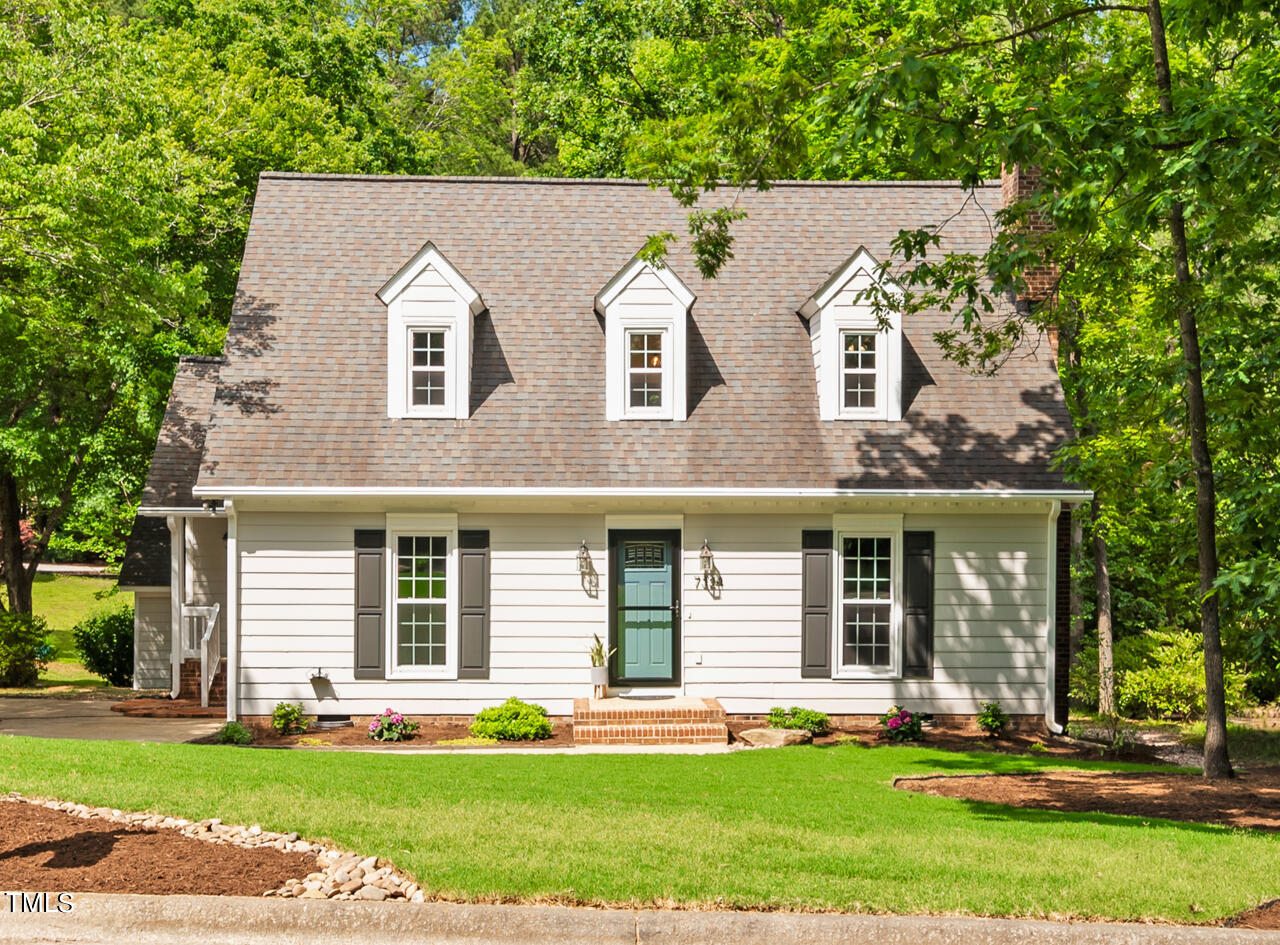 7324 Old Hundred Road Raleigh, NC 27613 - Photo 85 of 92 front view of a house with a yard