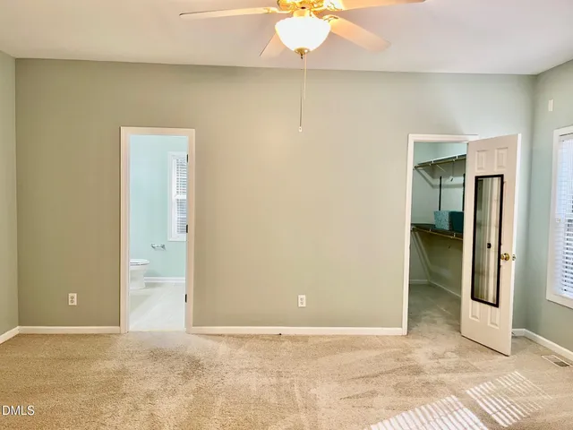 an empty room with a bathroom