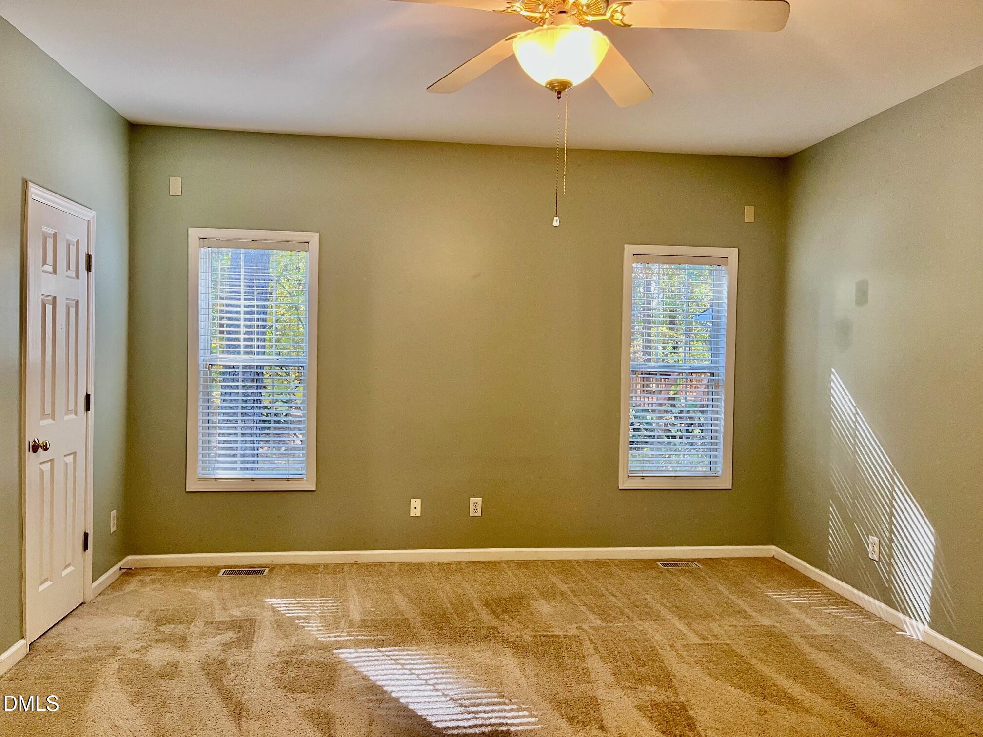 3027 Rennit Court Raleigh, NC 27603 - Photo 14 of 29 a view of an empty room with a window