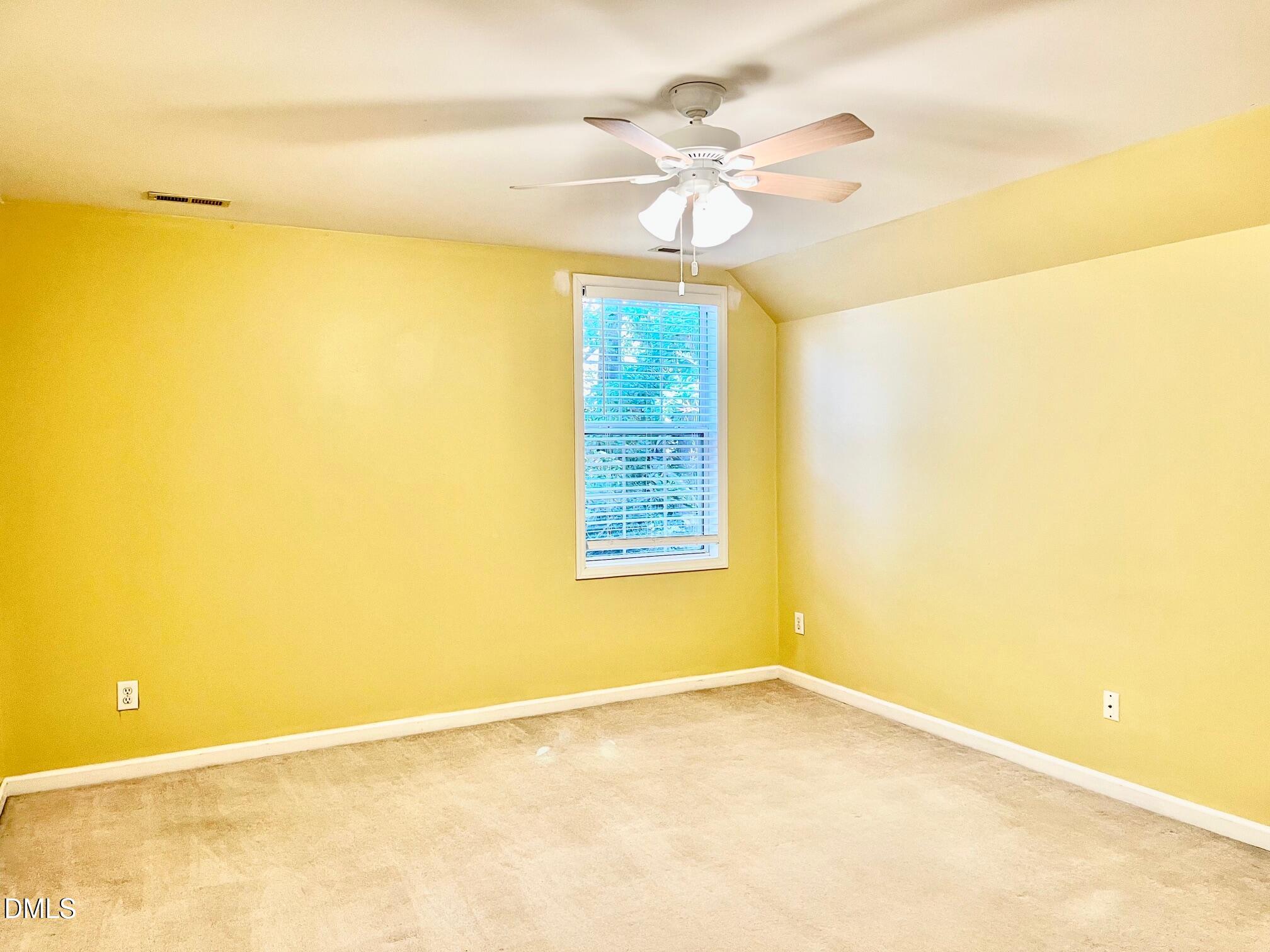 3027 Rennit Court Raleigh, NC 27603 - Photo 20 of 29 a view of an empty room with a window