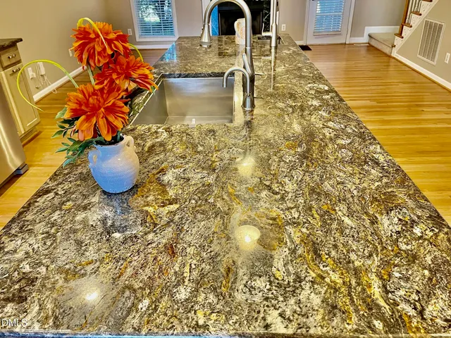 a vase of flowers sitting on a table