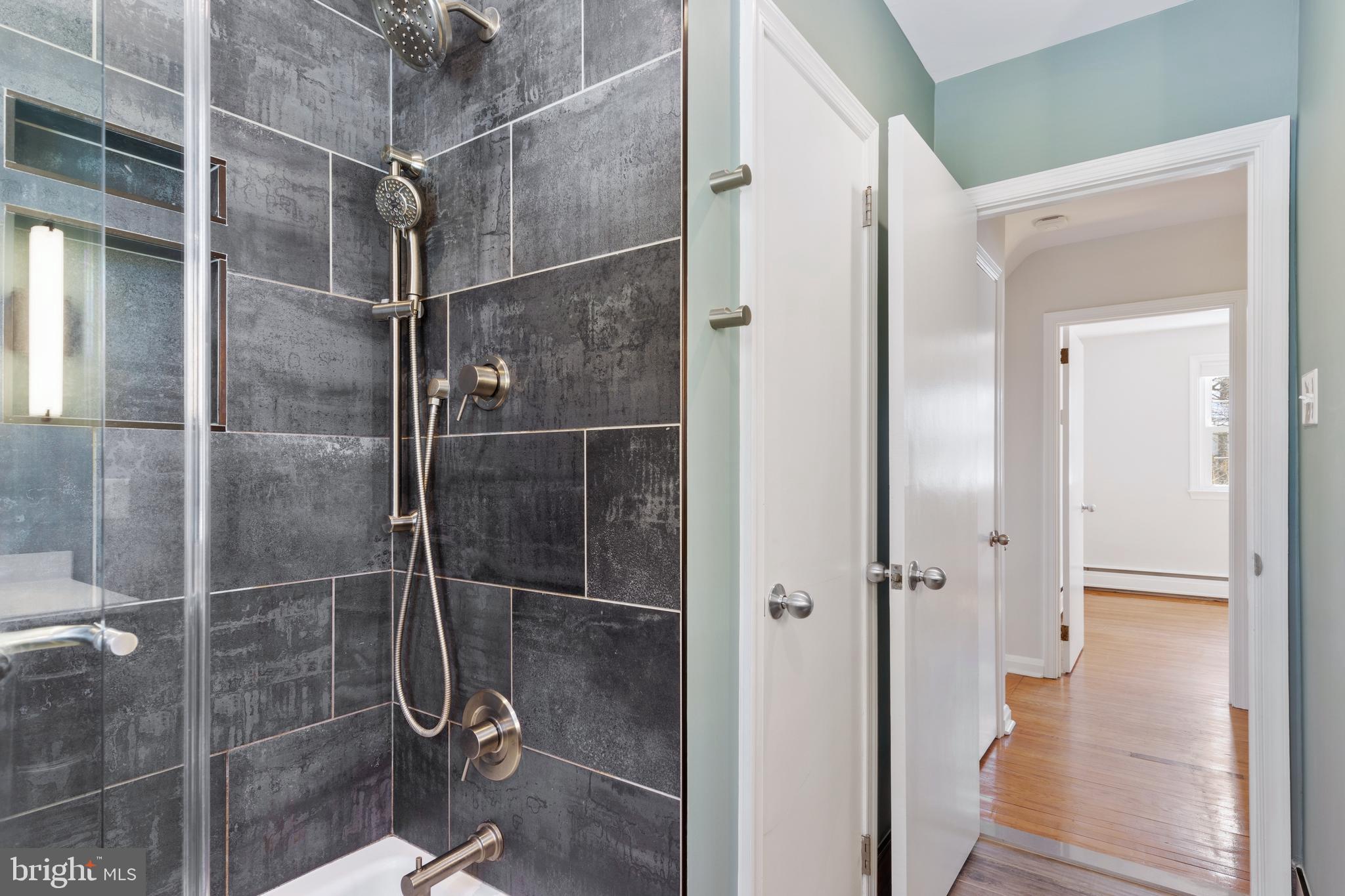 423 Old Lancaster Road Berwyn, PA 19312 - Photo 15 of 20 Seamless glass doors & tile surround