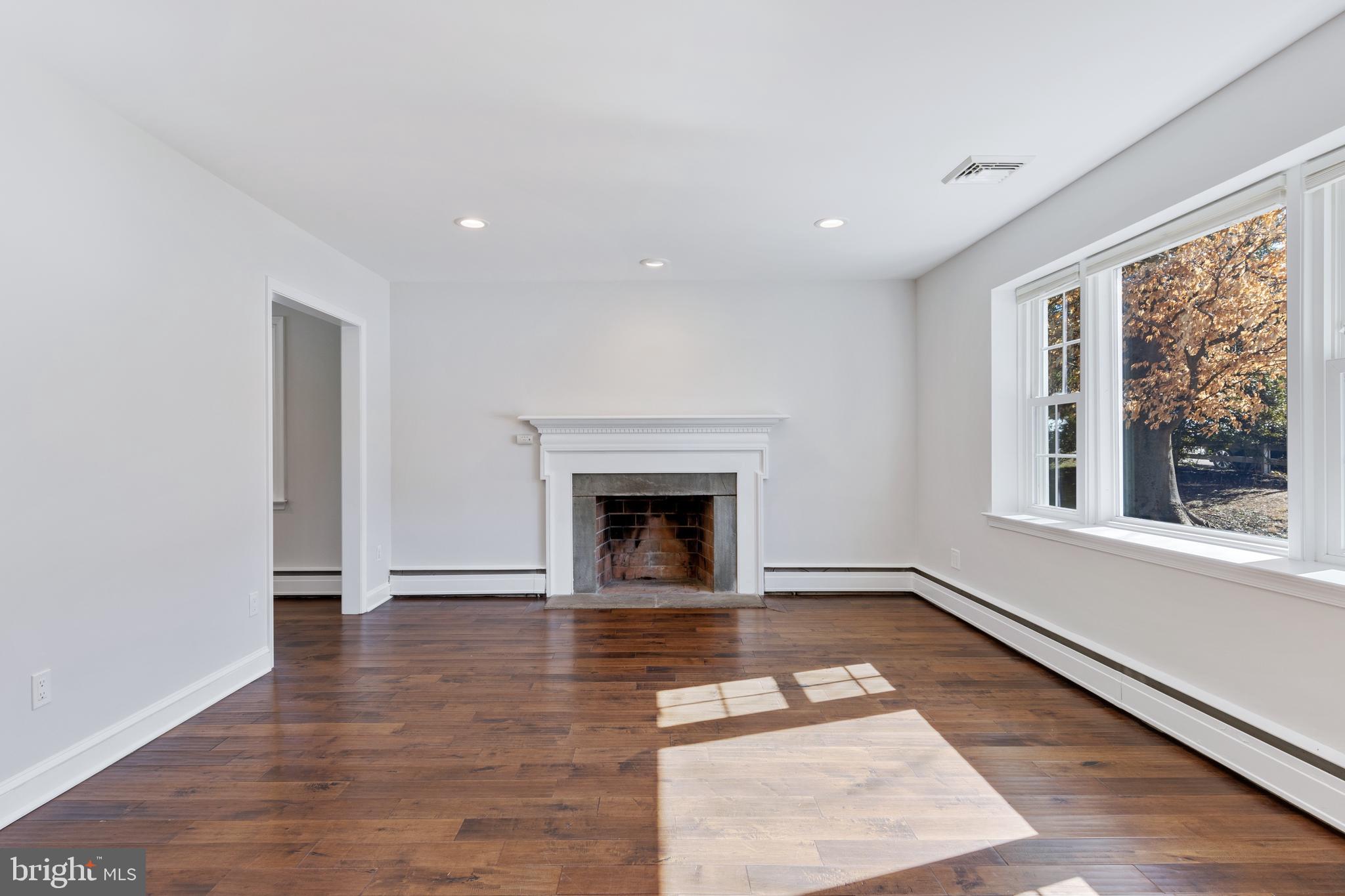 423 Old Lancaster Road Berwyn, PA 19312 - Photo 3 of 20 Living Room w/hand scraped hardwoods