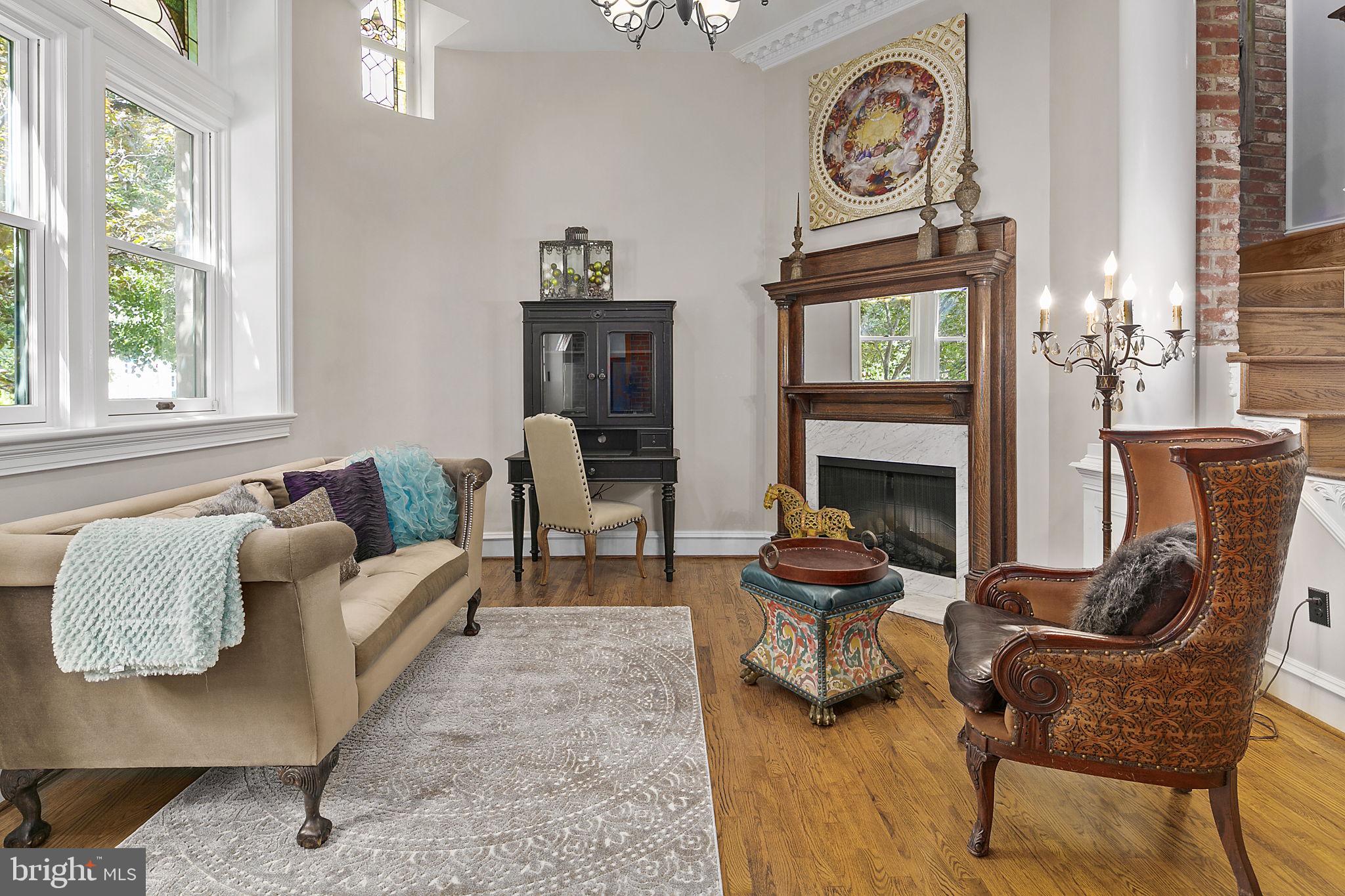 904 D Street Southeast, Unit 8 Washington, DC 20003 - Photo 5 of 24 Spacious living room, high ceilings and fireplace