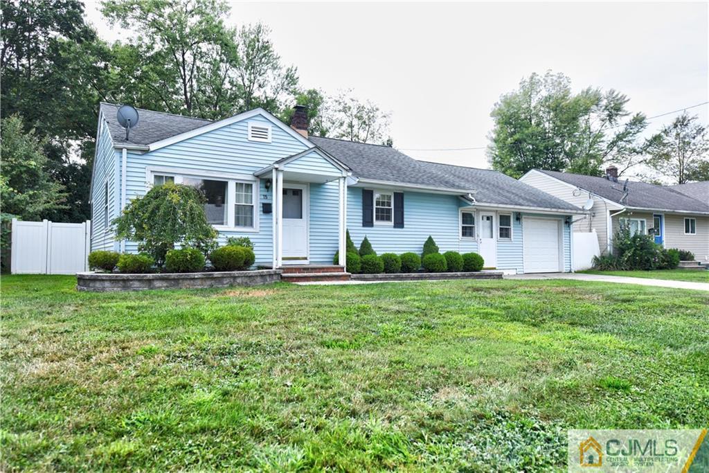 15 Burnham Road East Brunswick, NJ 08816 - Photo 1 of 16 a view of a house with backyard and garden