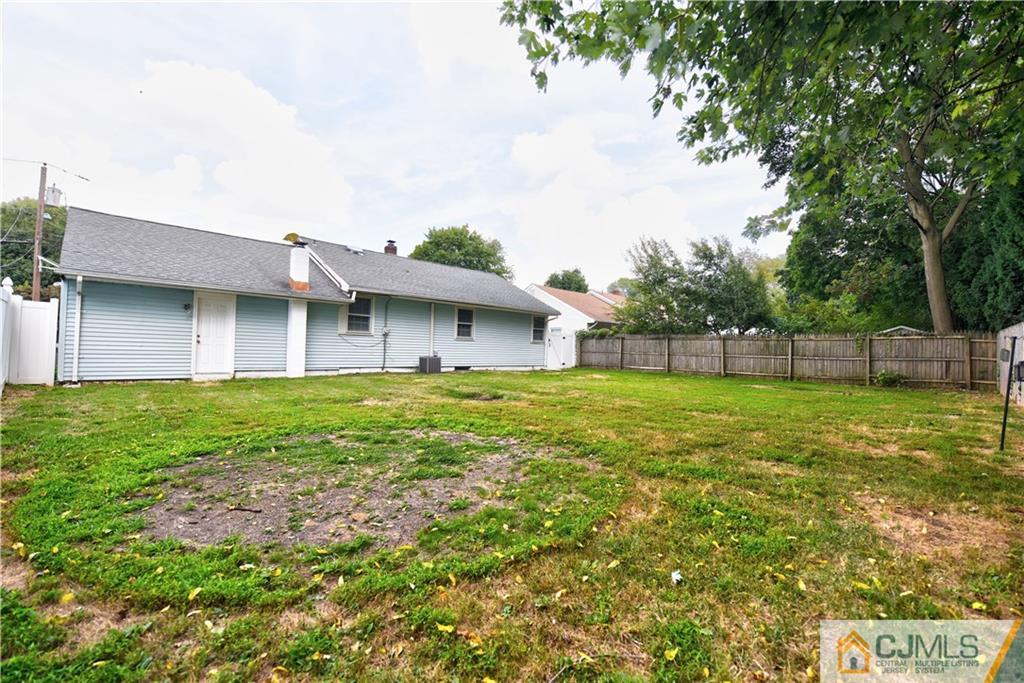 15 Burnham Road East Brunswick, NJ 08816 - Photo 14 of 16 a view of a house with a backyard