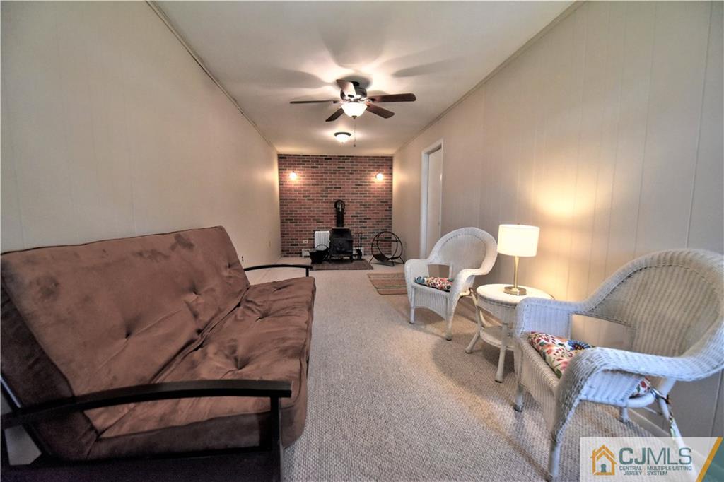 15 Burnham Road East Brunswick, NJ 08816 - Photo 8 of 16 a living room with furniture