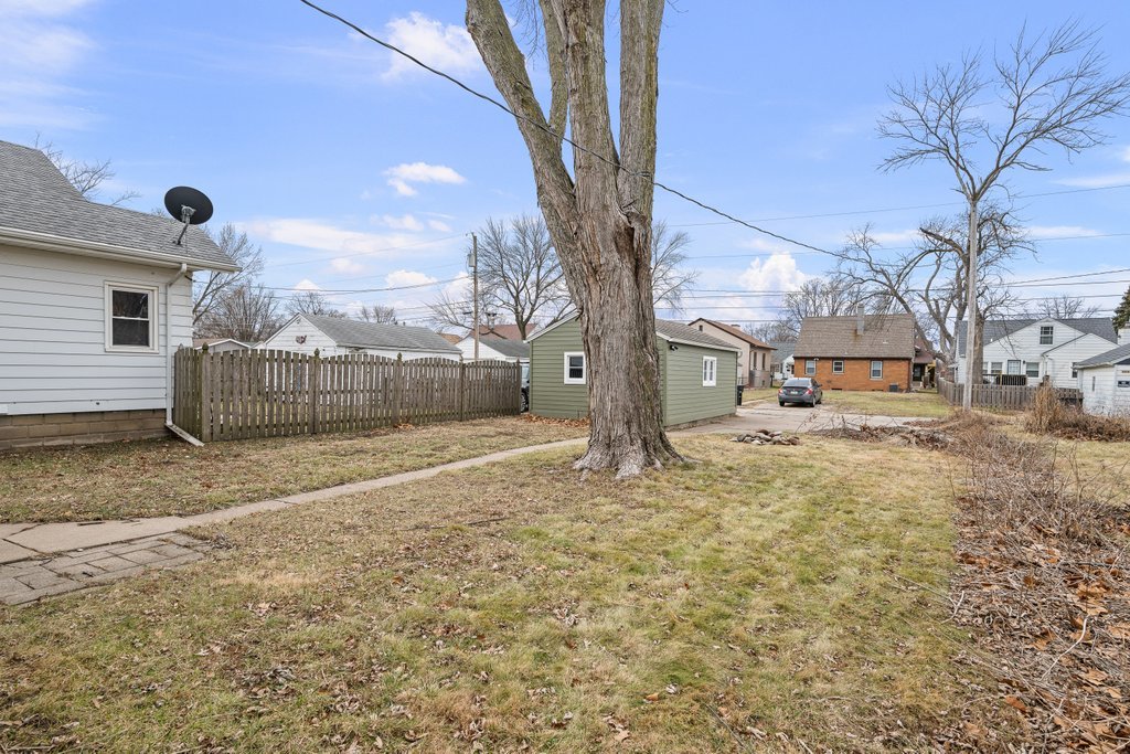2036 46th Street Rock Island, IL 61201 - Photo 17 of 24 a view of a yard with a house
