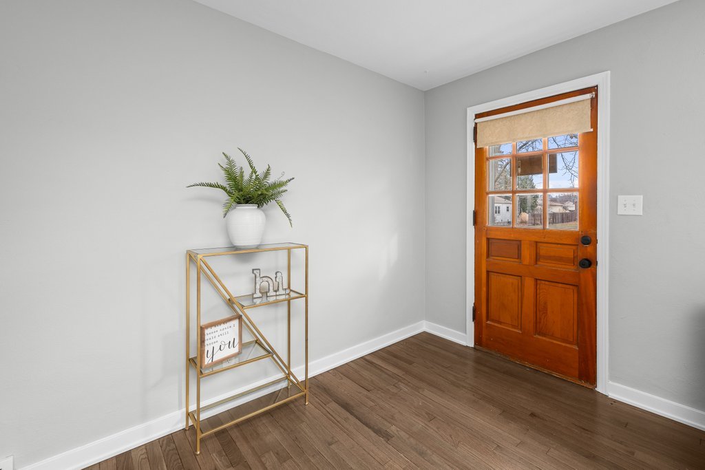2036 46th Street Rock Island, IL 61201 - Photo 2 of 24 an entryway with wooden floor
