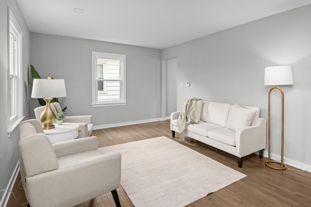 2036 46th Street Rock Island, IL 61201 - Photo 3 of 24 a living room with furniture and a window