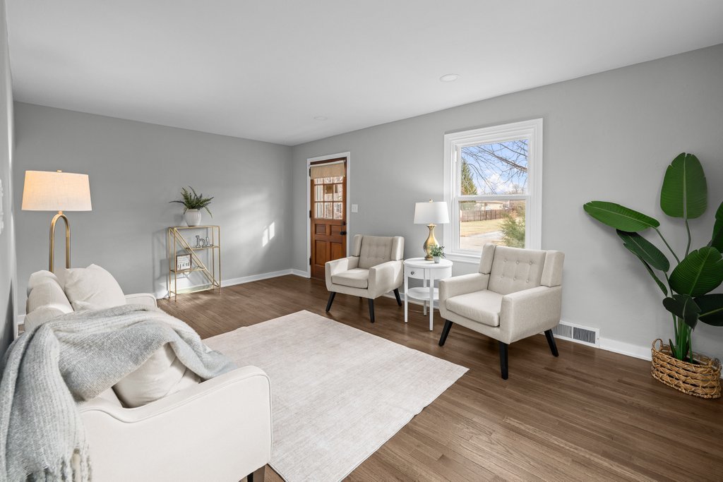 2036 46th Street Rock Island, IL 61201 - Photo 4 of 24 a bedroom with furniture and wooden floor