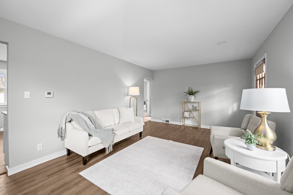 2036 46th Street Rock Island, IL 61201 - Photo 5 of 24 a living room with furniture and a lamp