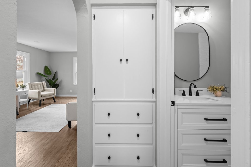 2036 46th Street Rock Island, IL 61201 - Photo 10 of 24 a bathroom with a sink and a mirror