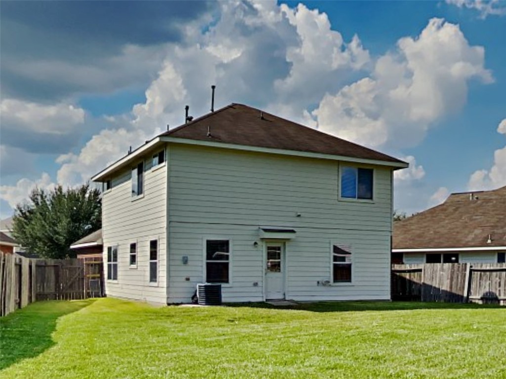 14427 Brunswick Point Lane Houston, TX 77047 - Photo 20 of 20 a view of a house with a yard