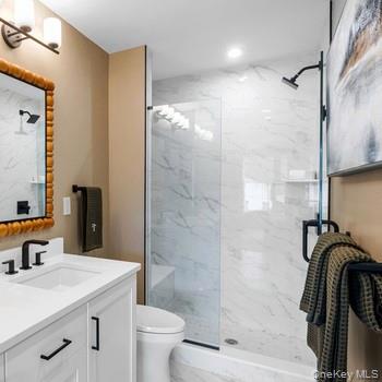 5132 Teaberry Lane, Unit 22 Fishkill, NY 12524 - Photo 6 of 6 Full bath with vanity and a marble finish shower