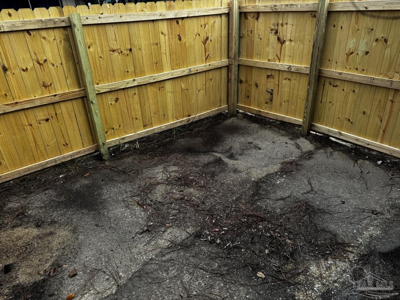 1460 Bakalane Court, Unit A Pensacola, FL 32504 - Photo 23 of 24 a view of a room with wooden walls