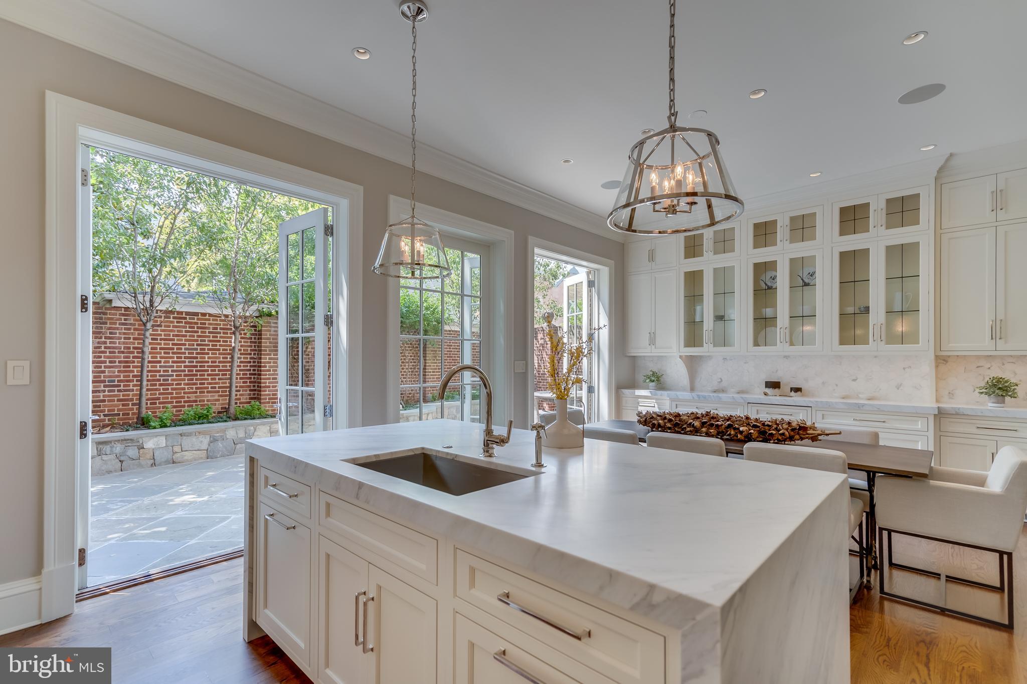 1315 31st Street Northwest Washington, DC 20007 - Photo 13 of 29 GOURMET OPEN KITCHEN OPENING TO GARDEN