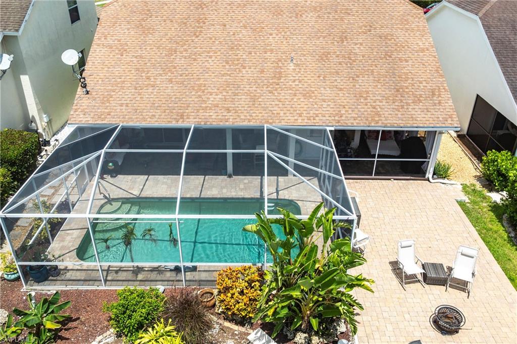 6769 Berwick Place Naples, FL 34104 - Photo 20 of 21 a view of a backyard