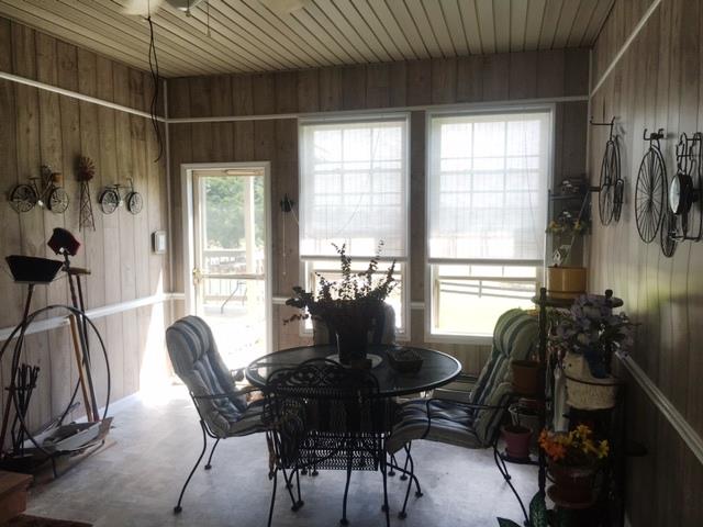 3343 Knight Road Woodlawn, TN 37191 - Photo 14 of 29 Great sun room! Door leads to back deck.