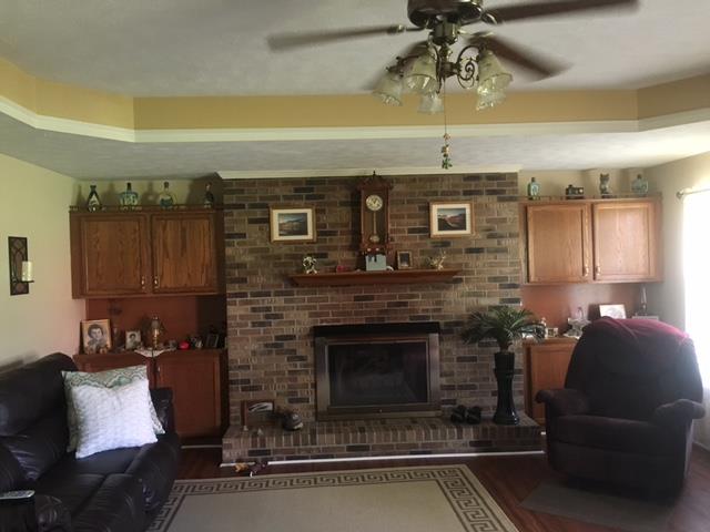 3343 Knight Road Woodlawn, TN 37191 - Photo 5 of 29 Large gas fireplace with built-in bookcases.