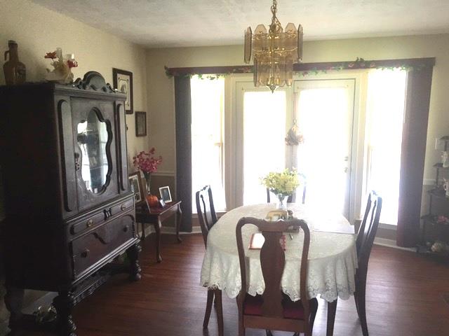 3343 Knight Road Woodlawn, TN 37191 - Photo 7 of 29 Large formal dining room with laminate floors. French doors lead to back deck.
