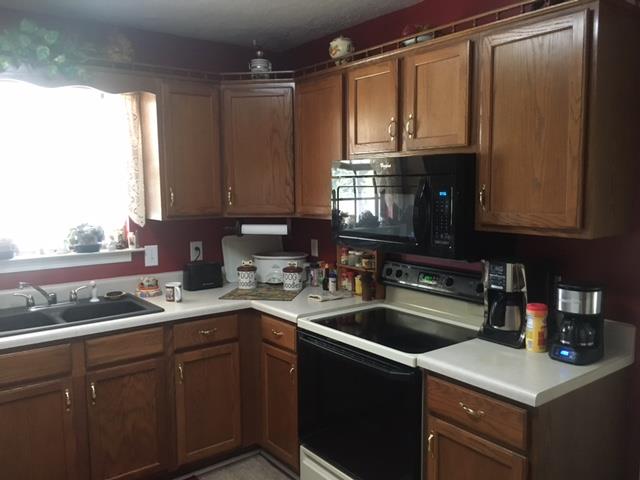 3343 Knight Road Woodlawn, TN 37191 - Photo 8 of 29 Kitchen has nice cabinetry and large window over the sink.