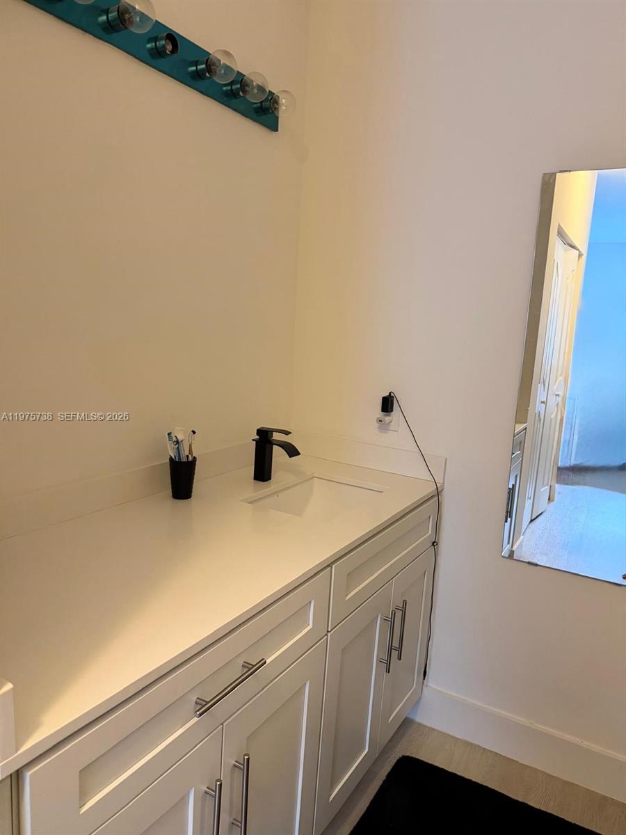 11269 Southwest 231st Lane Miami, FL 33170 - Photo 12 of 19 a utility room with dryer and washer