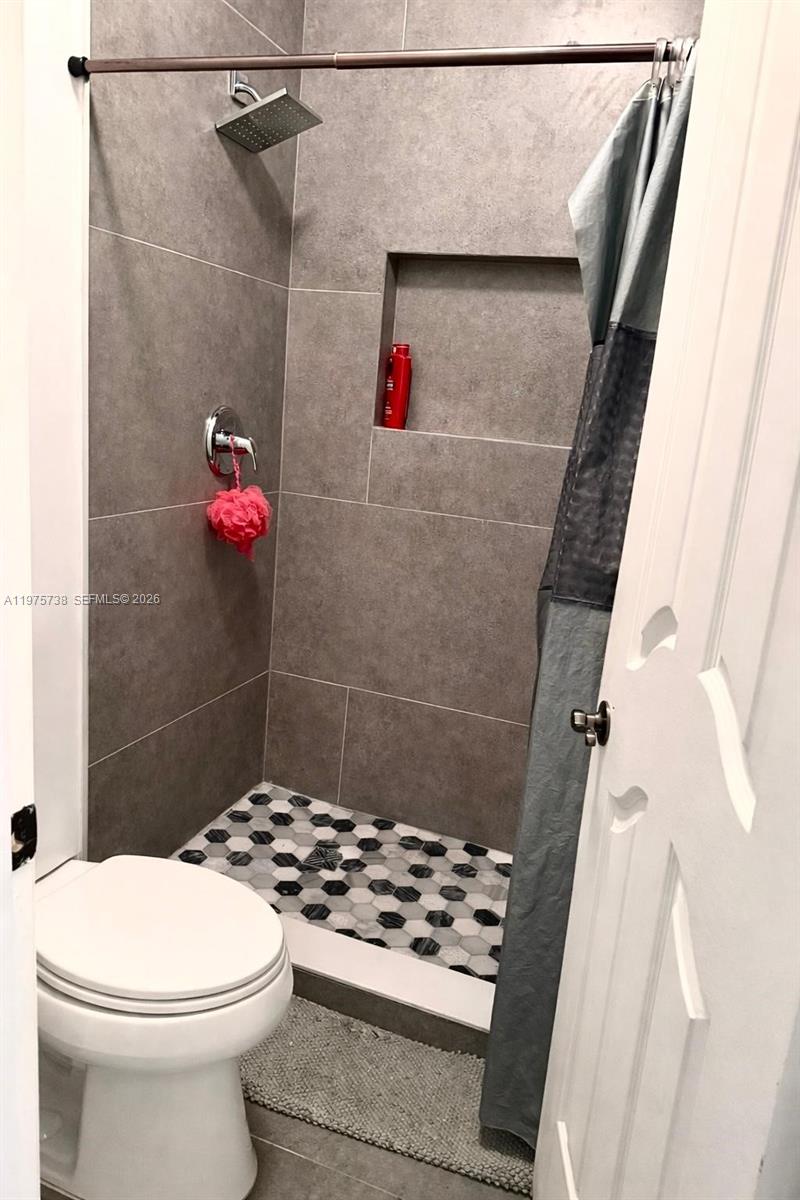 11269 Southwest 231st Lane Miami, FL 33170 - Photo 13 of 19 a bathroom with a sink and a toilet