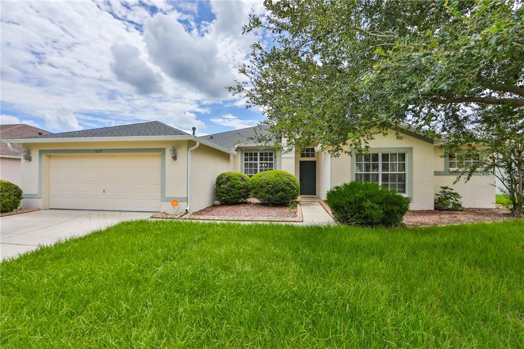 4321 Brandon Ridge Drive Valrico, FL 33594 - Photo 1 of 1 Front of House, Mature Landscaping
