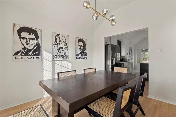 a view of a dining room with furniture