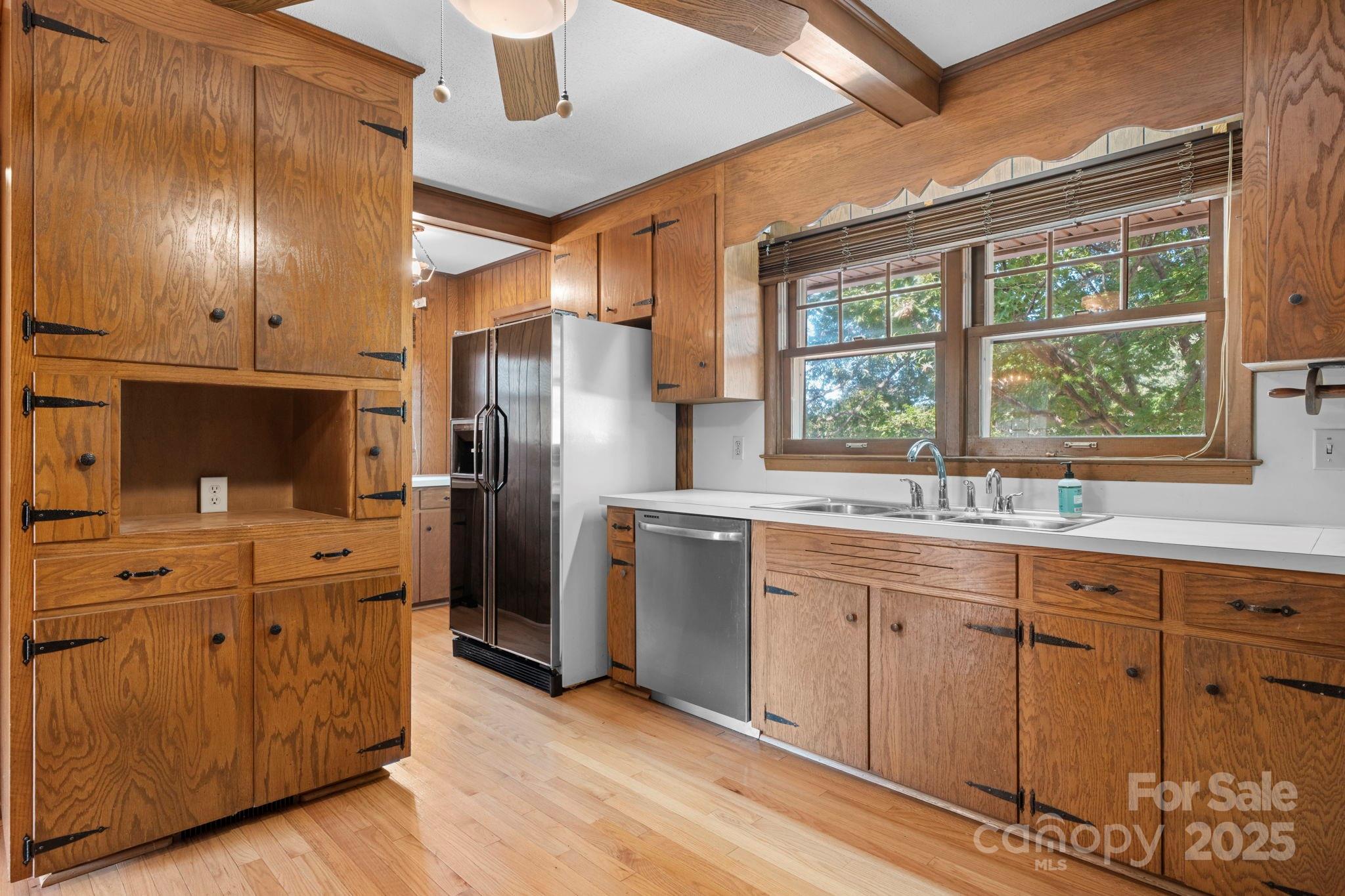 2551 Buffalo Shoals Road Newton, NC 28658 - Photo 12 of 47 a kitchen with cabinets and wooden floor