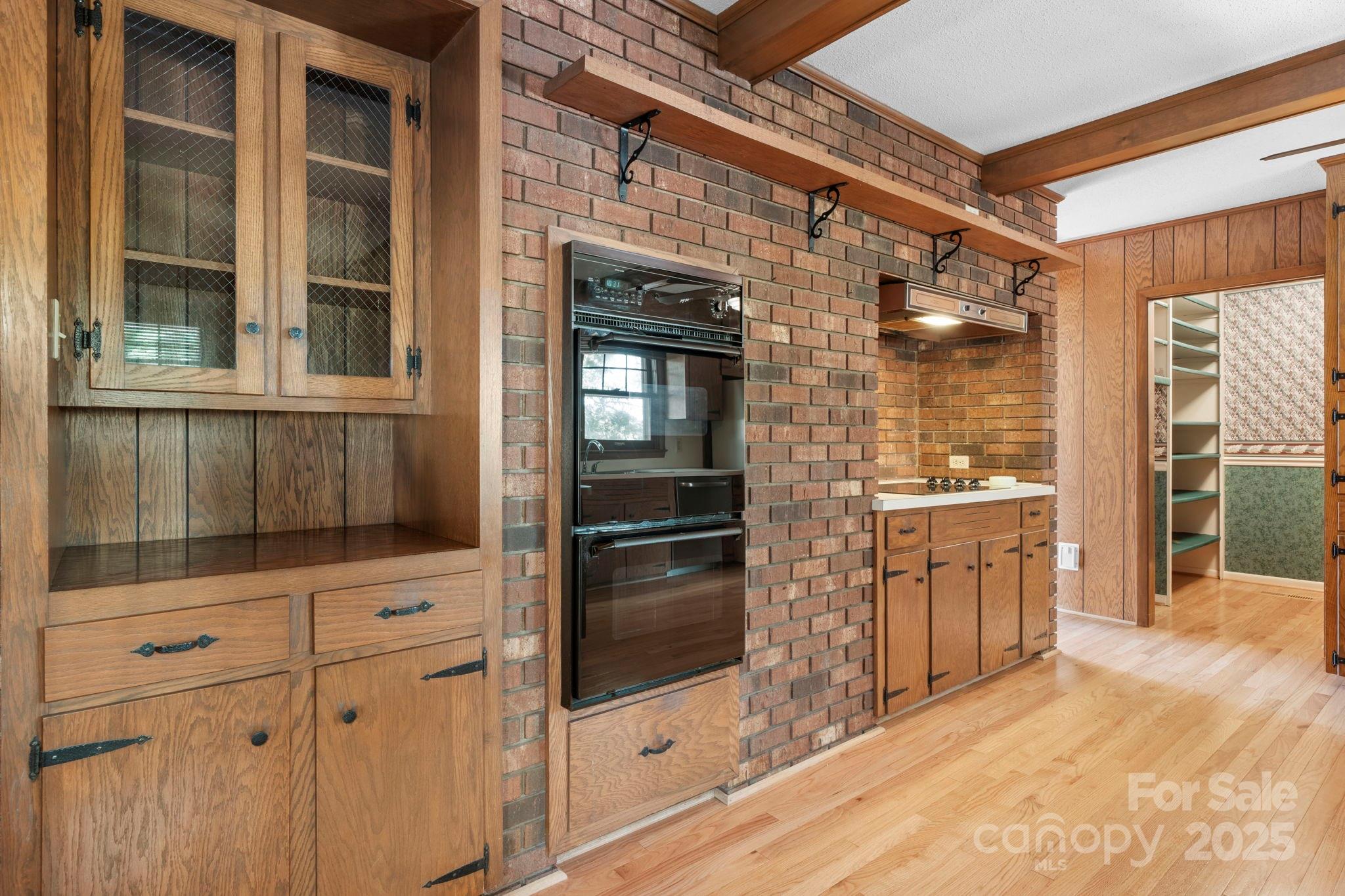 2551 Buffalo Shoals Road Newton, NC 28658 - Photo 13 of 47 a kitchen with a refrigerator and a stove