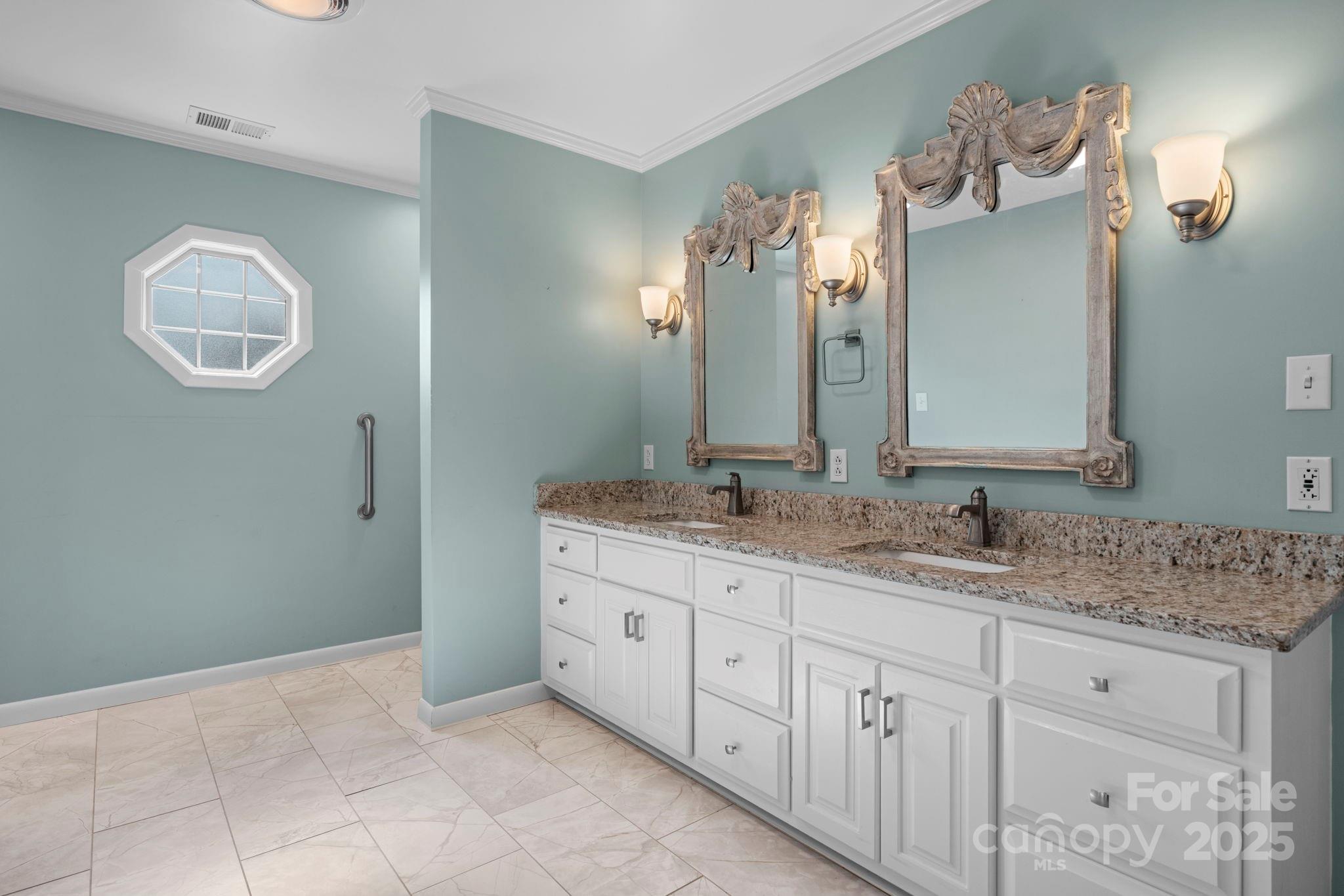 2551 Buffalo Shoals Road Newton, NC 28658 - Photo 22 of 47 a bathroom with a sink and a mirror