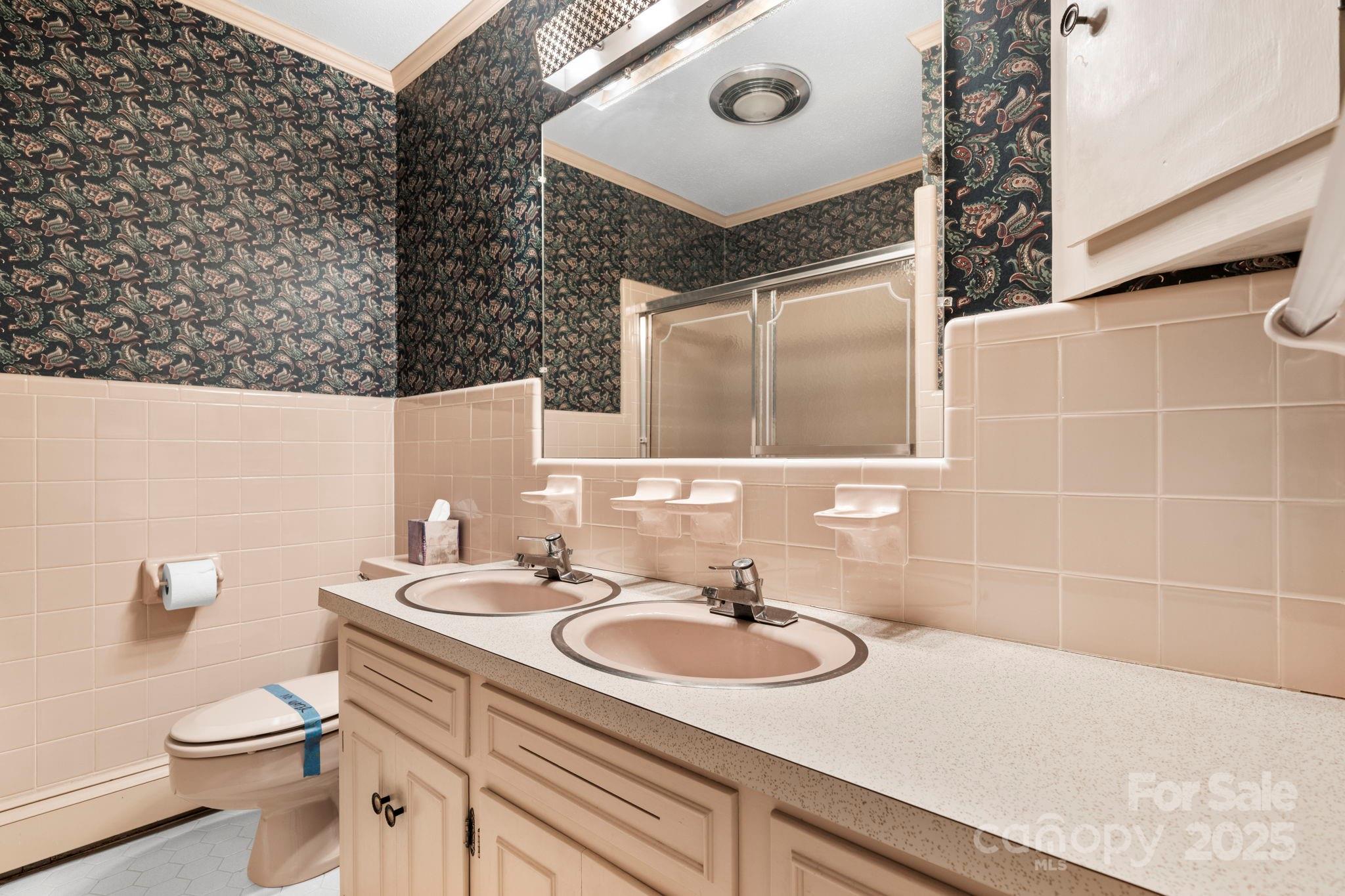 2551 Buffalo Shoals Road Newton, NC 28658 - Photo 27 of 47 a bathroom with a sink and a toilet