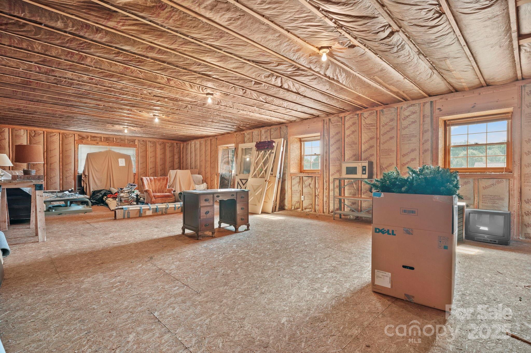 2551 Buffalo Shoals Road Newton, NC 28658 - Photo 41 of 47 a view of a livingroom with furniture and a window