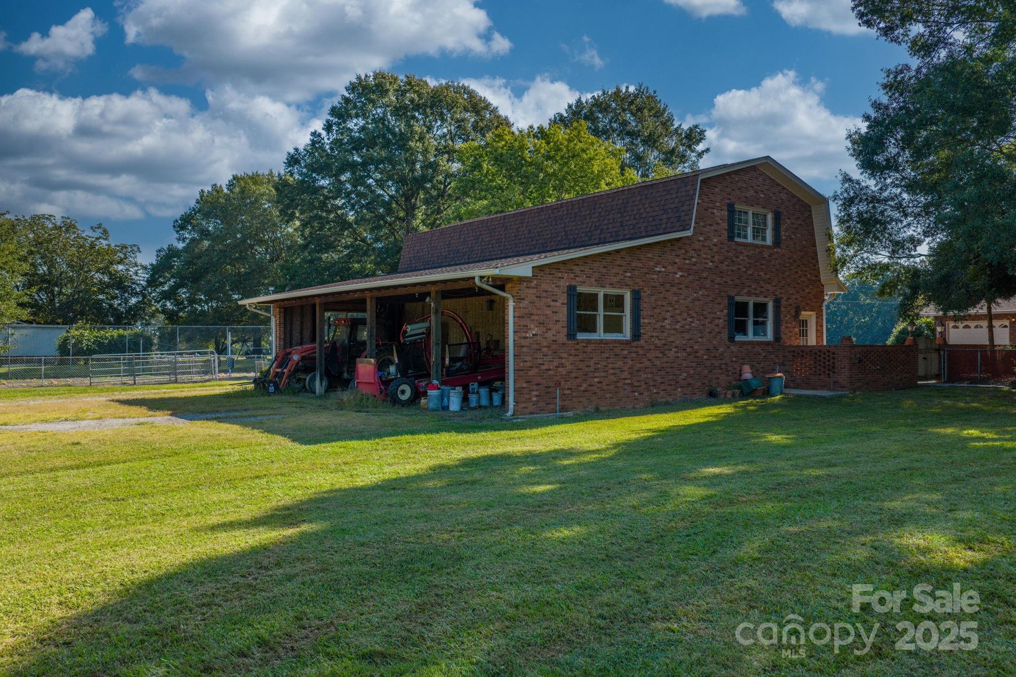 2551 Buffalo Shoals Road Newton, NC 28658 - Photo 43 of 47 a view of a house with a backyard patio and swimming pool
